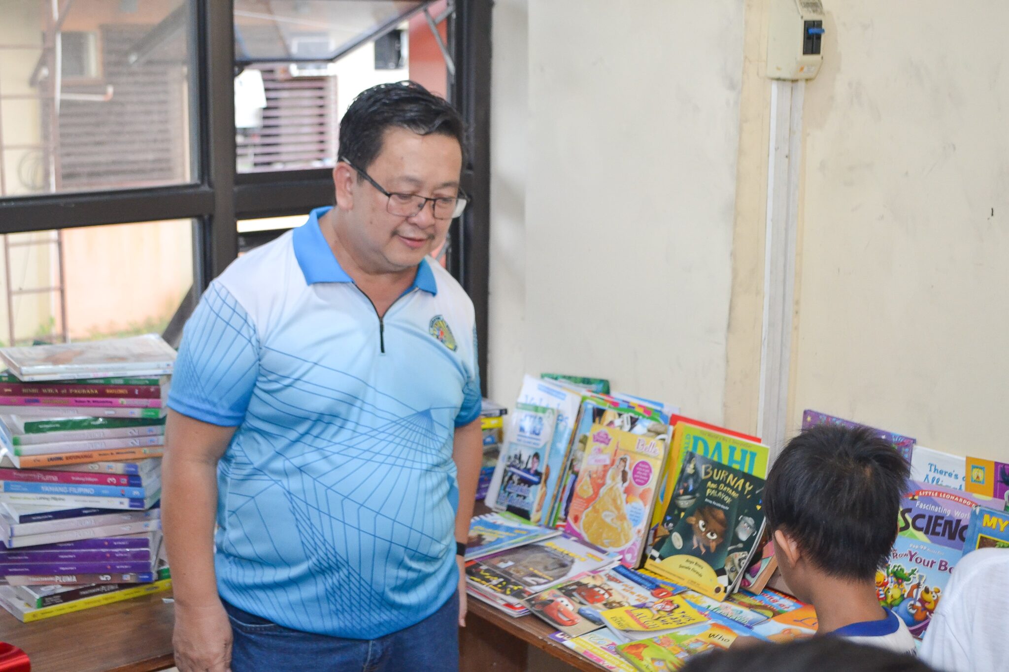 JRU ESD Launches Reading Center at Barangay Harapin ang Bukas - José ...
